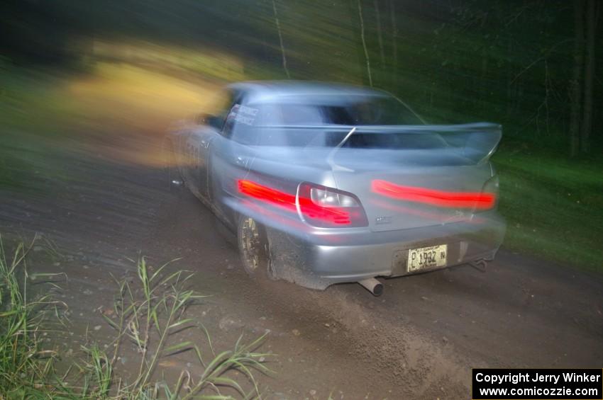 Robert Borowicz / Mariusz Borowicz Subaru WRX STi drifts through the spectator point on SS13, Sockeye Lake.