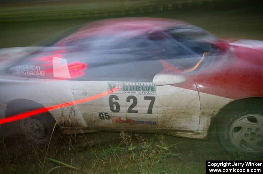 Marcin Kowalski / Maciej Sawicki Mitsubishi Eclipse GST through the spectator point on SS13, Sockeye Lake.