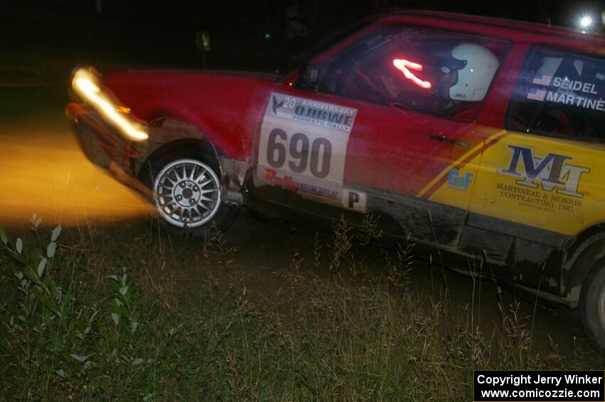 Carl Seidel / Jay Martineau VW GTI through the spectator point on SS13, Sockeye Lake.