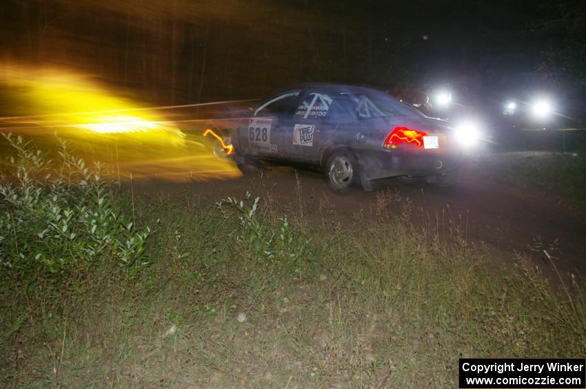 Dan Adamson / Jeremiah Schubitzke Saturn SL2 through the spectator point on SS13, Sockeye Lake.