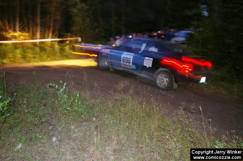 Bryan Holder / Tracy Payeur Plymouth Neon through the spectator point on SS13, Sockeye Lake.