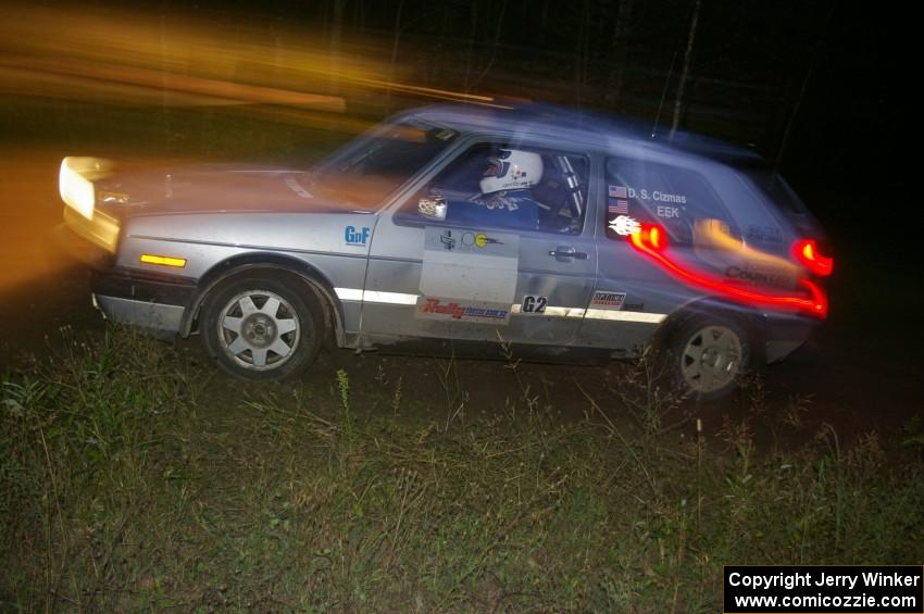 Dave Cizmas / ??? come through a hairpin left on SS13, Sockeye Lake, running as med sweep in their VW GTI.