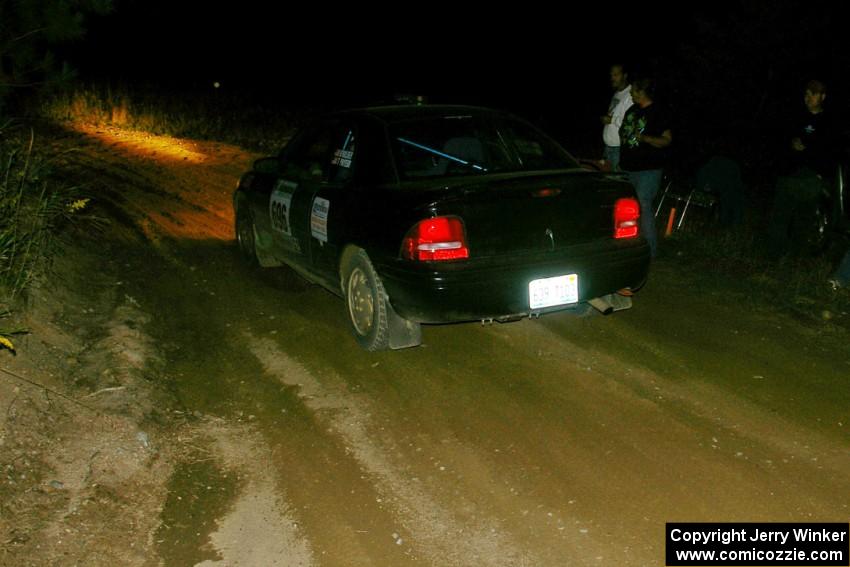 Bryan Holder / Tracy Payeur Plymouth Neon leaves the start of SS15, Sugar Bush.