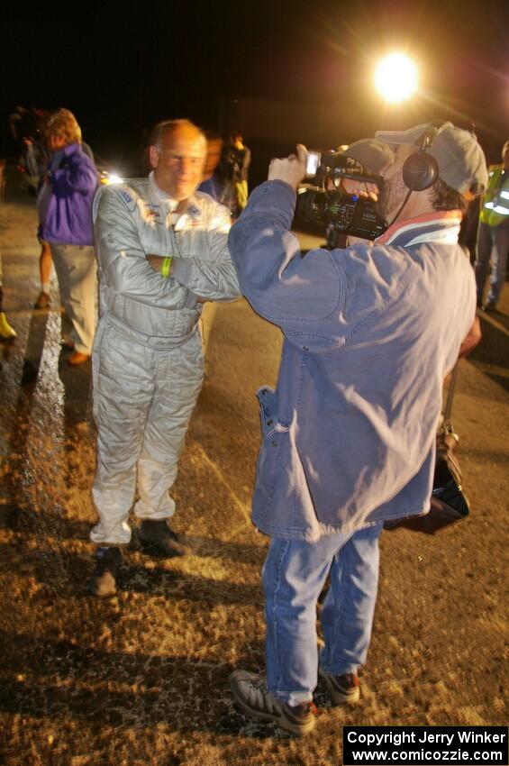 Stig Blomqvist is interviewed after taking his Subaru WRX STi to the win at Ojibwe. Ana Goni was his navigator for the weekend.