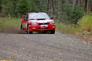 Pat Richard / Nathalie Richard Subaru WRX STi heads uphill near the start of SS1, Herman.