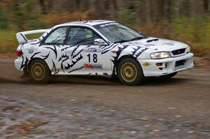 Matt Iorio / Ole Holter	Subaru Impreza heads uphill near the start of SS1, Herman.