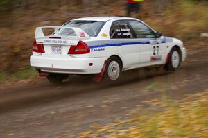 Chris Gilligan / Joe Petersen Mitsubishi Lancer Evo IV heads uphill near the start of SS1, Herman.