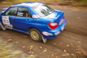 Eric Langbein / Jeremy Wimpey Subaru WRX heads uphill near the start of SS1, Herman.