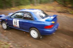 Bob Olson / Ryan Johnson Subaru Impreza RS heads uphill near the start of SS1, Herman.