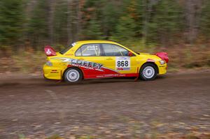 Gerry Coffey / Dave Dooley Mitsubishi Lancer Evo 8 heads uphill near the start of SS1, Herman.