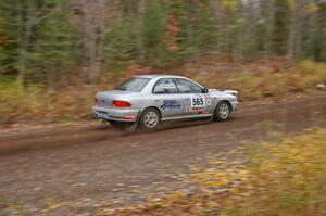 Russ Hodges / Mike Rossey Subaru Impreza heads uphill near the start of SS1, Herman.