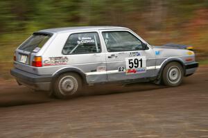 Dave Cizmas / Silas Himes VW GTI heads uphill near the start of SS1, Herman.