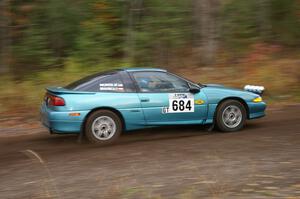 Adam Markut / John Nordlie Eagle Talon TSI heads uphill near the start of SS1, Herman.