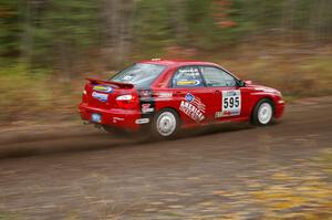 John Cirisan / Josh Hamacher Subaru WRX heads uphill near the start of SS1, Herman.