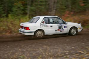 Greg Woodside / Tom Woodside Dodge Shadow Turbo heads uphill near the start of SS1, Herman.