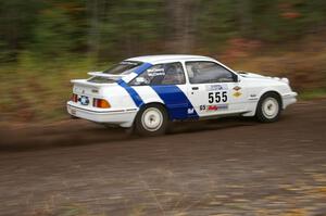 Colin McCleery / Nancy McCleery Ford Sierra XR8 heads uphill near the start of SS1, Herman.