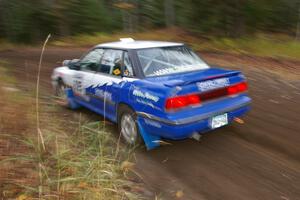 Mike Wray / Don DeRose Subaru Legacy Sport heads uphill near the start of SS1, Herman.