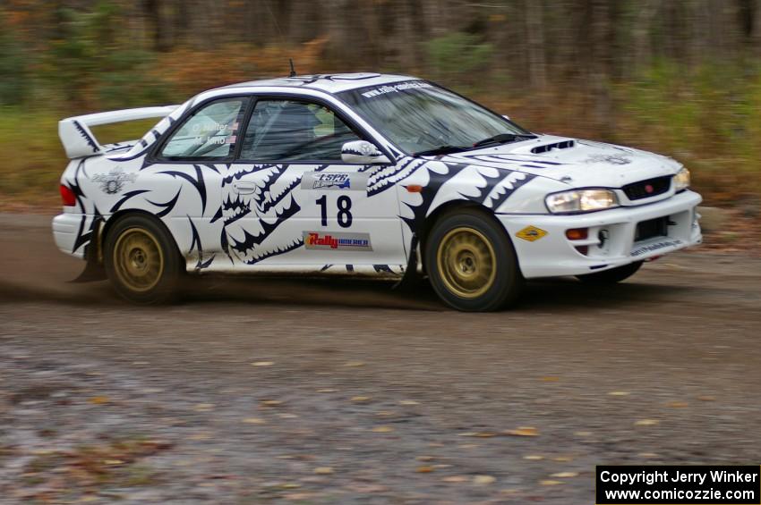 Matt Iorio / Ole Holter	Subaru Impreza heads uphill near the start of SS1, Herman.