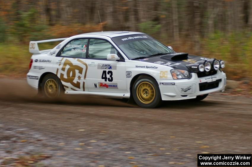 Ken Block / Alex Gelsomino Subaru WRX STi heads uphill near the start of SS1, Herman.