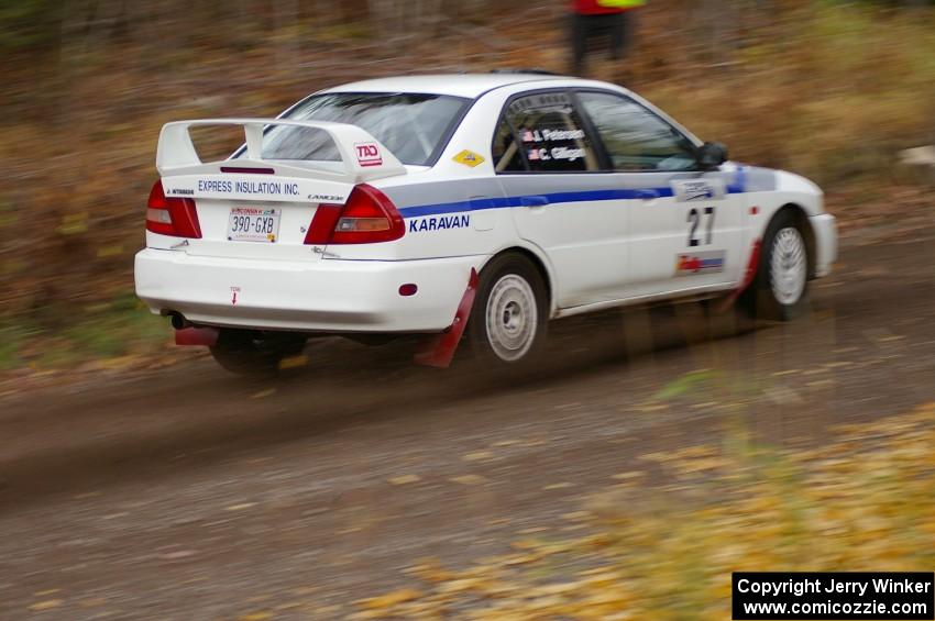 Chris Gilligan / Joe Petersen Mitsubishi Lancer Evo IV heads uphill near the start of SS1, Herman.