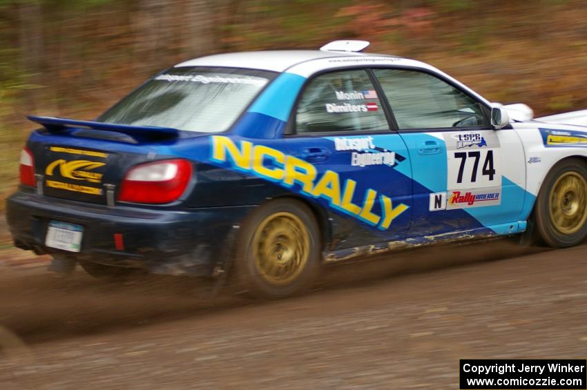 Otis Dimiters / Peter Monin Subaru WRX STi heads uphill near the start of SS1, Herman.