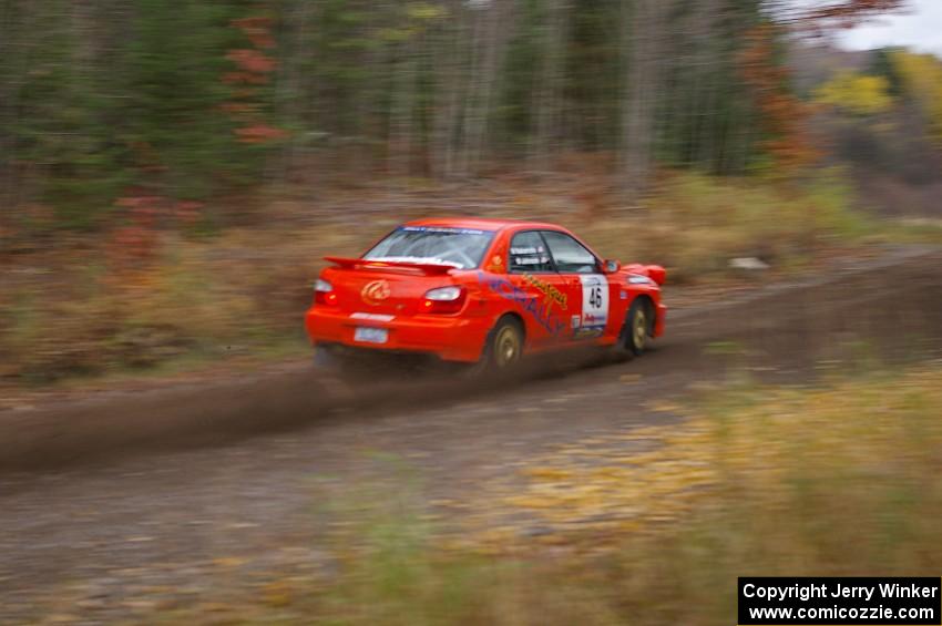 Matthew Johnson / Wendy Nakamoto Subaru WRX heads uphill near the start of SS1, Herman.