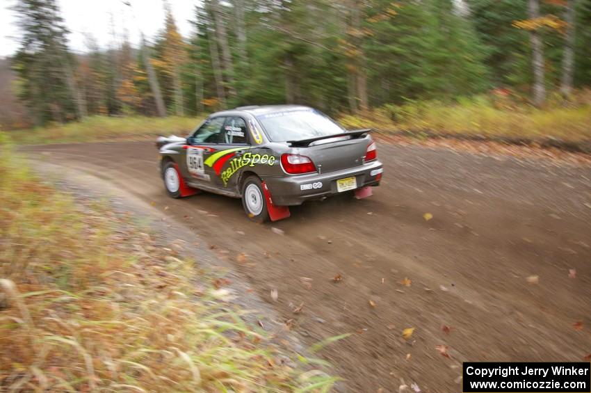 Dave Anton / Alan Ockwell Subaru WRX STi heads uphill near the start of SS1, Herman.