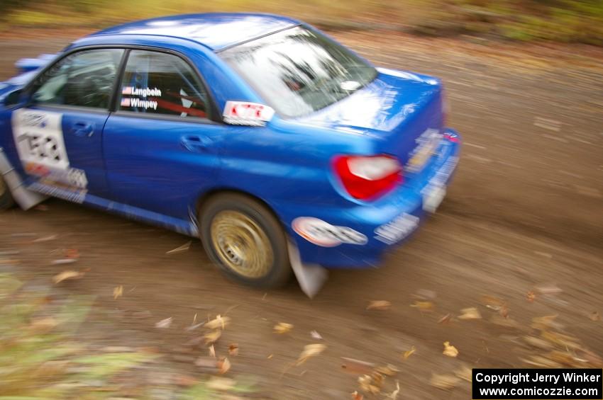 Eric Langbein / Jeremy Wimpey Subaru WRX heads uphill near the start of SS1, Herman.