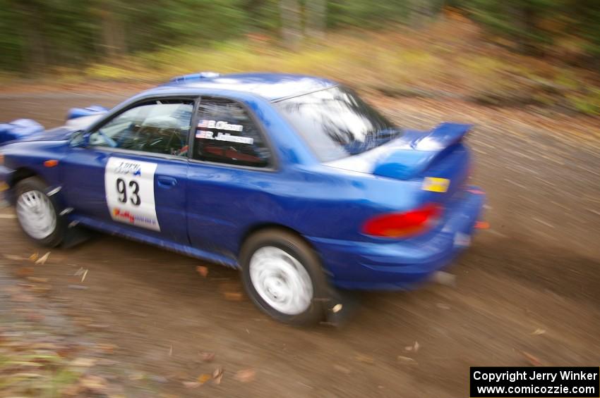 Bob Olson / Ryan Johnson Subaru Impreza RS heads uphill near the start of SS1, Herman.