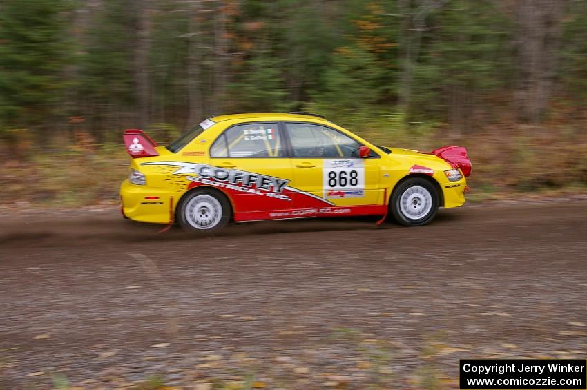 Gerry Coffey / Dave Dooley Mitsubishi Lancer Evo 8 heads uphill near the start of SS1, Herman.