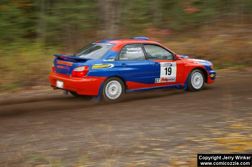 Tim Penasack / Marc Goldfarb Subaru WRX heads uphill near the start of SS1, Herman.