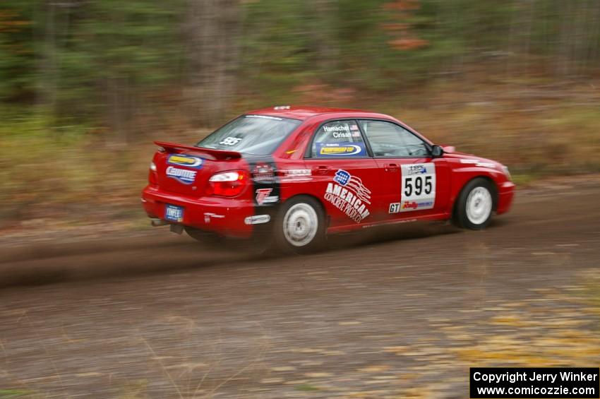 John Cirisan / Josh Hamacher Subaru WRX heads uphill near the start of SS1, Herman.