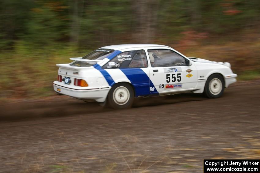 Colin McCleery / Nancy McCleery Ford Sierra XR8 heads uphill near the start of SS1, Herman.