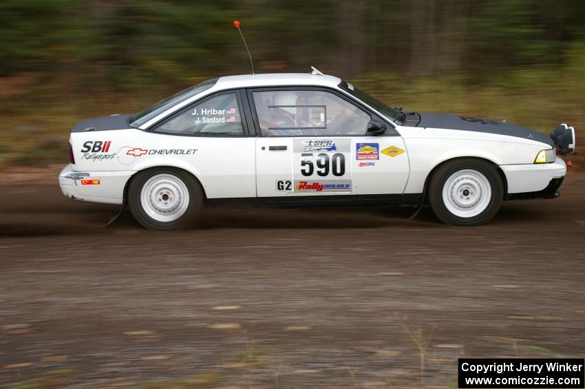 Joel Sanford / Jeff Hribar Chevy Cavalier heads uphill near the start of SS1, Herman.