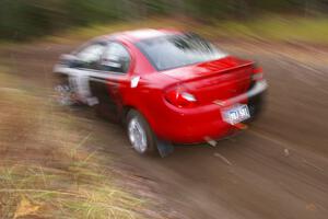 Sans Thompson / Craig Marr Dodge Neon ACR heads uphill near the start of SS1, Herman.