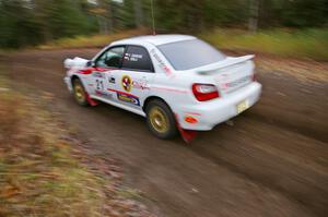 Yurek Cienkosz / Lukasz Szela Subaru Impreza RS heads uphill near the start of SS1, Herman.