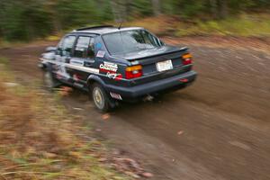 Mike Merbach / Jeff Feldt VW Jetta heads uphill near the start of SS1, Herman.