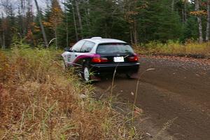 Matt Johnston / Alex Kihurani Honda Civic heads uphill near the start of SS1, Herman.