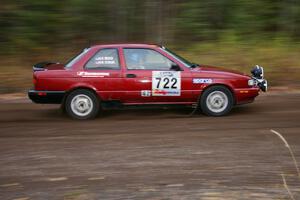 Ross Wegge / Rob Stroik Nissan Sentra SE-R heads uphill near the start of SS1, Herman.