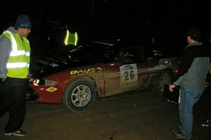 Cary Kendall / Scott Friberg Eagle Talon check into the finish control of SS4, Baraga Plains, and are greeted by Russ Johnson.