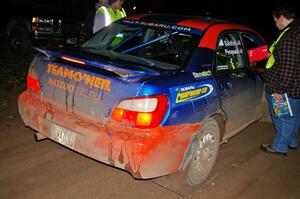 Tim Penasack / Marc Goldfarb hand in their time card at the finish of Baraga Plains, SS4, in their Subaru WRX.