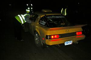 Jake Himes / Matt Himes Mazda RX-7 checks into the finish control of SS4, Baraga Plains.