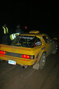 Jake Himes / Matt Himes Mazda RX-7 checks into the finish control of SS4, Baraga Plains.