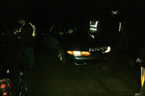 Adam Markut / John Nordlie Eagle Talon TSI checks into the finish control of SS4, Baraga Plains.