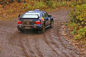 Travis Pastrana / Christian Edstrom Subaru WRX STi takes a wider line through the final corner of SS7, Gratiot Lake 1.