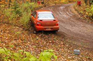 Matthew Johnson / Wendy Nakamoto Subaru WRX hits a greasy spot at the final corner of SS7, Gratiot Lake 1