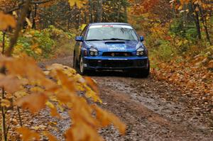 Mark McElduff / Damien Irwin Subaru WRX STi rockets up the final hill of Gratiot Lake 1, SS7, just before the finish.