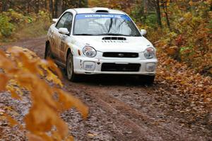 Fintan McCarthy / Noel Gallagher Subaru WRX STi nears the final corner of Gratiot Lake 1, SS7.