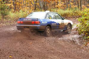 Mike Wray / Don DeRose Subaru Legacy Sport drifts the back end through the final muddy corner of Gratiot Lake 1, SS7.