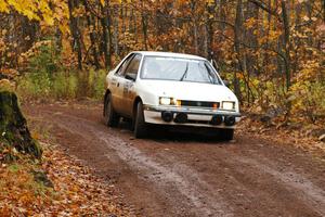 Greg Woodside / Tom Woodside Dodge Shadow Turbo drifts wide through the final corner of Gratiot Lake 1, SS7.